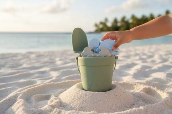 Silicone Sand bucket with toys and shovel Background